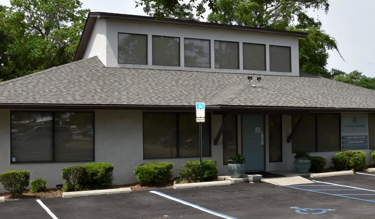 The Bayou Dental building at 4461 Bayou Blvd. in Pensacola, Florida, with its own car park.